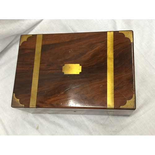 31 - A MAHOGANY WRITING SLOPE WITH BRASS INLAYS W: 35CM