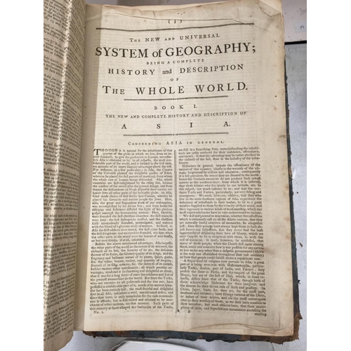 32 - THREE LARGE ANTIQUE LEATHER BOUND BOOKS, TWO BEING THE COMPLETE SYSTEM OF GEOGRAPHY PUBLISHED 1742 A... 