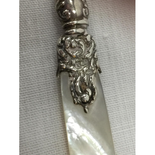 33 - A SHEFFIELD HALLMARKED SILVER KNIFE WITH MOTHER OF PEARL STYLE HANDLE AND FURTHER BIRMINGHAM HALLMAR... 