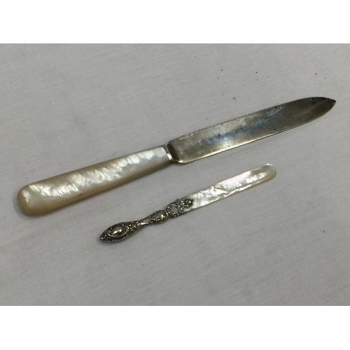 33 - A SHEFFIELD HALLMARKED SILVER KNIFE WITH MOTHER OF PEARL STYLE HANDLE AND FURTHER BIRMINGHAM HALLMAR... 