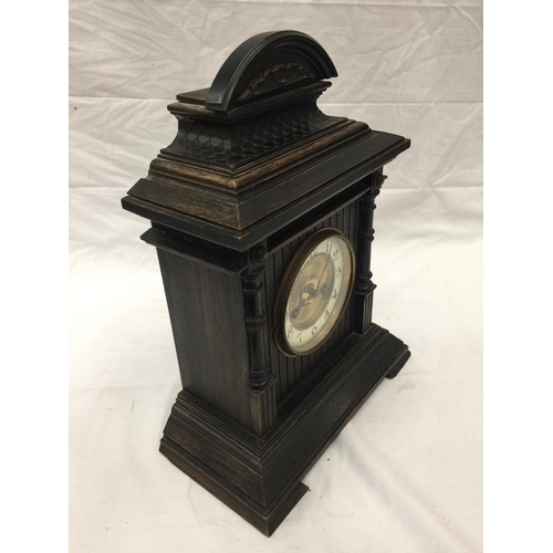 35A - AN ORNATE CHIMING MANTLE CLOCK WITH GERMAN MOVEMENT AND PENDULUM. KEY IS PRESENT AND WORKING AT TIME... 