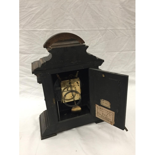 35A - AN ORNATE CHIMING MANTLE CLOCK WITH GERMAN MOVEMENT AND PENDULUM. KEY IS PRESENT AND WORKING AT TIME... 