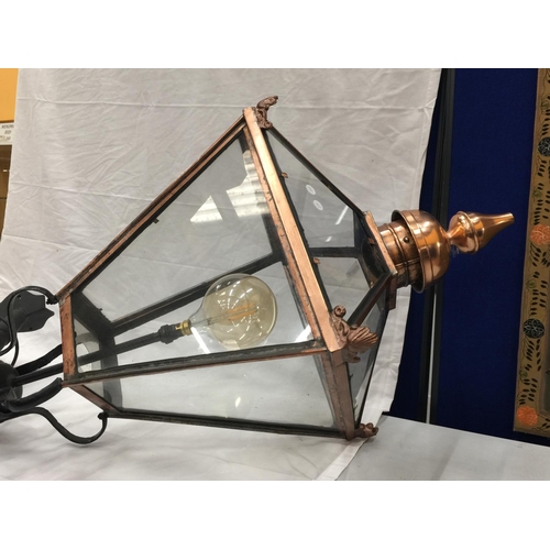 37 - A VERY LARGE VINTAGE COPPER FRAMED STREET LAMP WITH GLASS PANELS. APPROX HEIGHT: 120CM