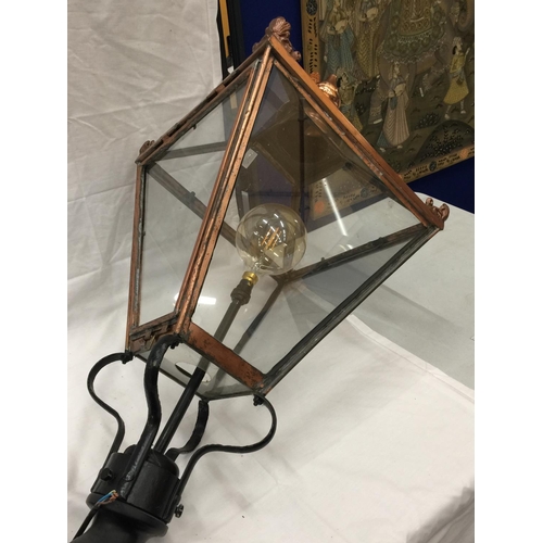 37 - A VERY LARGE VINTAGE COPPER FRAMED STREET LAMP WITH GLASS PANELS. APPROX HEIGHT: 120CM