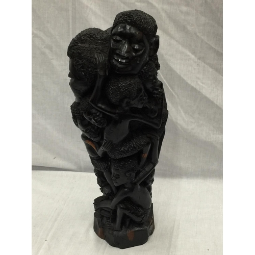 41 - A LARGE HAND CARVED AFRICAN TRIBAL STYLE FIGURE H: 54CM