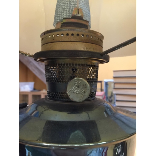 47 - A PAIR OF VINTAGE BRASS OIL LAMPS WITH APRICOT COLOURED GLASS SHADES A/F REPAIRS TO ONE GLASS SHADE