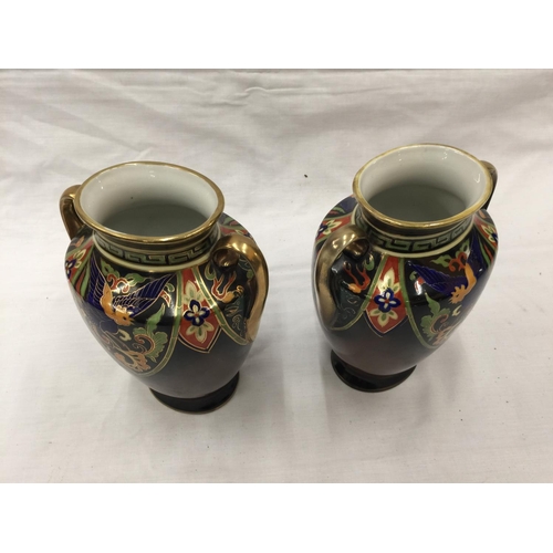 49 - A PAIR OF HAND PAINTED NORITAKE VASES WITH GILT EDGING AND BIRD DESIGN TO FRONT H: 20CM