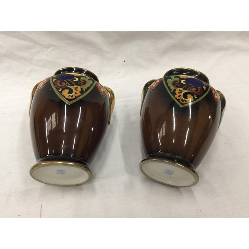 49 - A PAIR OF HAND PAINTED NORITAKE VASES WITH GILT EDGING AND BIRD DESIGN TO FRONT H: 20CM