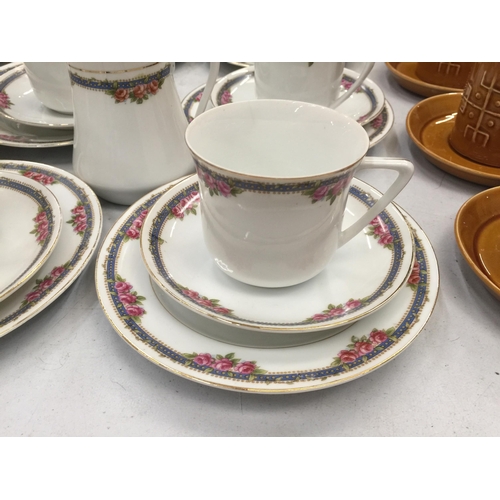 204 - A LARGE QUANTITY OF TEAWARE TO INCLUDE CUPS, SAUCERS, PLATES, CREAM JUG AND SUGAR BOWL