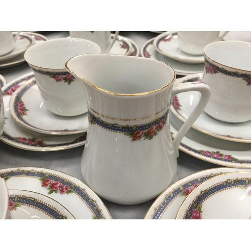 204 - A LARGE QUANTITY OF TEAWARE TO INCLUDE CUPS, SAUCERS, PLATES, CREAM JUG AND SUGAR BOWL