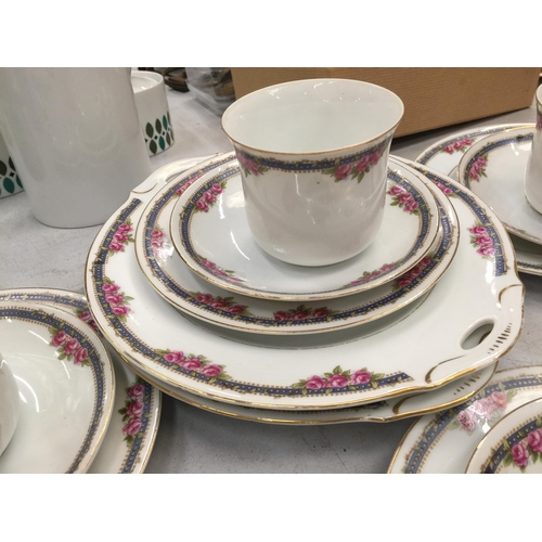 204 - A LARGE QUANTITY OF TEAWARE TO INCLUDE CUPS, SAUCERS, PLATES, CREAM JUG AND SUGAR BOWL