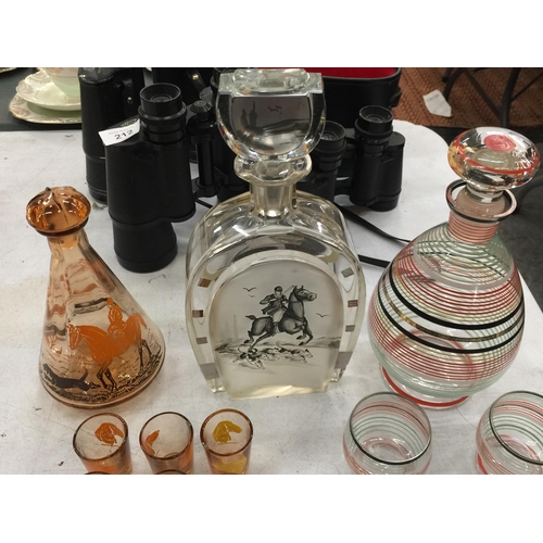 213 - A PALE ORANGE DECANTER WITH A HUNTING SCENE AND MATCHING LICQUOR GLASSES, A DECANTER WITH HUNTING SC... 