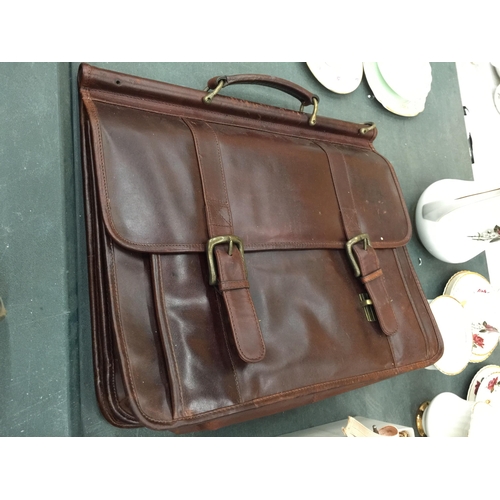 222 - A BROWN WILSON'S LEATHER BRIEF CASE WITH HANDLE