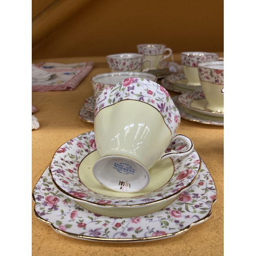 261 - A WINDSOR CHINA TEASET IN A YELLOW AND FLORAL PATTERN WITH GILT RIMS TO INCLUDE A CAKE PLATE, CREAM ... 