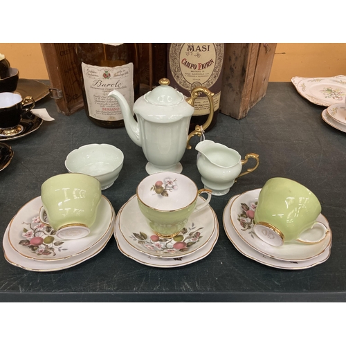 268 - A PARAGON PALE GREEN COFFEE POT, CREAM JUG AND SUGAR BOWL PLUS THREE PALE GREEN CHINA TRIOS WITH BLO... 