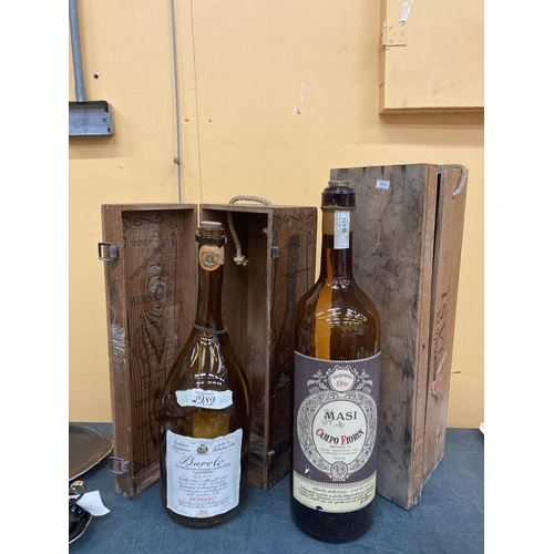 269 - A DOUBLE MAGNUM SIZED BAROLO BOTTLE IN A WOODEN BOX PLUS A 3.75 LITRE WINE BOTTLE IN BOX BOTH EMPTY ... 