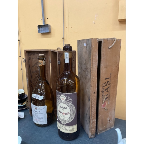 269 - A DOUBLE MAGNUM SIZED BAROLO BOTTLE IN A WOODEN BOX PLUS A 3.75 LITRE WINE BOTTLE IN BOX BOTH EMPTY ... 