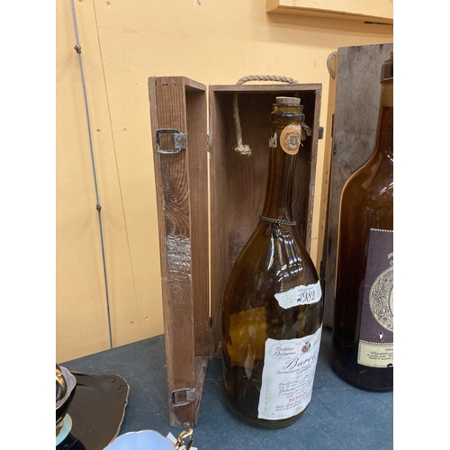 269 - A DOUBLE MAGNUM SIZED BAROLO BOTTLE IN A WOODEN BOX PLUS A 3.75 LITRE WINE BOTTLE IN BOX BOTH EMPTY ... 