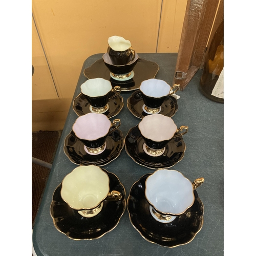 270 - A VINTAGE ROYAL STANDARD 'HARLEQUIN' TEASET - BLACK WITH DIFFERENT COLOURED INTERIORS- TO INCLUDE CA... 