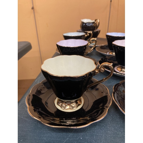 270 - A VINTAGE ROYAL STANDARD 'HARLEQUIN' TEASET - BLACK WITH DIFFERENT COLOURED INTERIORS- TO INCLUDE CA... 