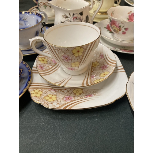 291 - A QUANTITY OF VINTAGE CHINA TRIOS AND CUPS AND SAUCERS TO INCLUDE ROYAL ALBERT, PARAGON, ETC PLUS A ... 