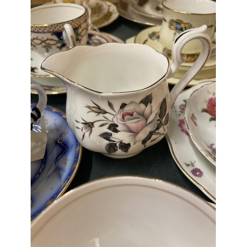 291 - A QUANTITY OF VINTAGE CHINA TRIOS AND CUPS AND SAUCERS TO INCLUDE ROYAL ALBERT, PARAGON, ETC PLUS A ... 