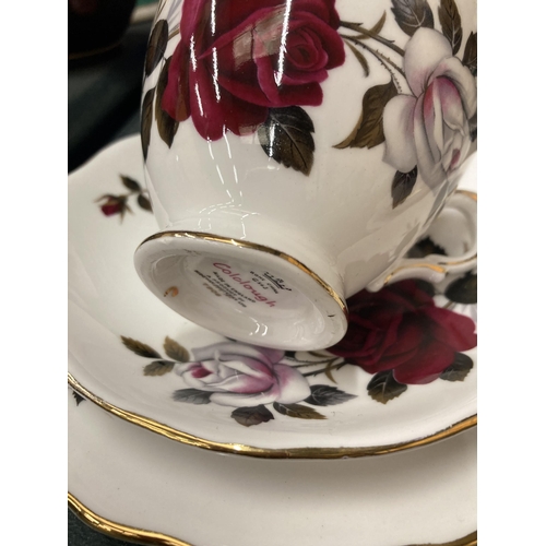 293 - A COLCLOUGH ROSE PATTERNED TEASET TO INCLUDE CREAM JUG, SUGAR BOWL CUPS, SAUCERS AND SIDE PLATES