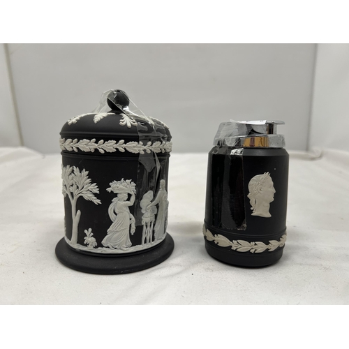 58 - TWO PIECES OF WEDGWOOD BLACK JASPERWARE TO INCLUDE A TABLE LIGHTER AND A LIDDED TRINKET BOX