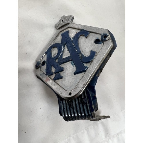 61 - A VINTAGE RAC METAL CAR BADGE AND A METAL 'L' PLATE