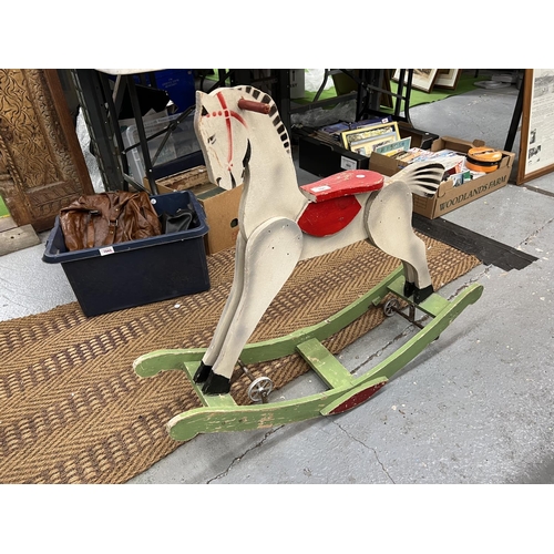 100 - A VINTAGE WOODEN CHILD'S METAMORPHIC ROCKING HORSE - IT CAN BE USED AS A ROCKER OR HAS WHEELS THAT E... 