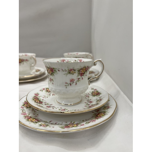 125 - SIX ELIZABETHAN CHINA 'CAPRICE' TRIOS WITH A FLORAL PATTERN