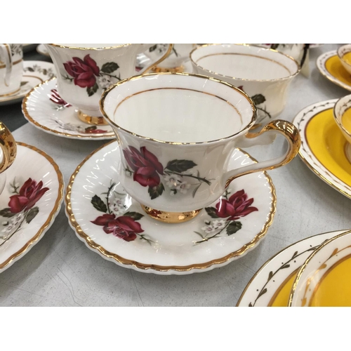 157 - A VINTAGE ROSE PATTERNED 'LUBORN' TEASET TO INCLUDE CUPS, SAUCERS, CREAM JUG AND SUGAR BOWL