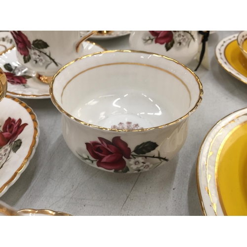 157 - A VINTAGE ROSE PATTERNED 'LUBORN' TEASET TO INCLUDE CUPS, SAUCERS, CREAM JUG AND SUGAR BOWL