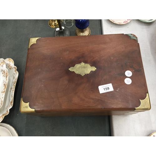 159 - A MAHOGANY WRITING SLOPE WITH BRASS DECORATION - IN NEED OF RESTORATION