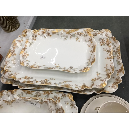 162 - A QUANTITY OF 'HAVILAND & CO' LIMOGES DINNERWARE INCLUDING SERVING PLATES, A SAUCE BOAT, ETC