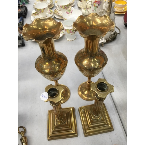 180 - A QUANTITY OF BRASSWARE TO INCLUDE CANDLESTICKS, ETCHED VASES, SHOE HORNS, ETC