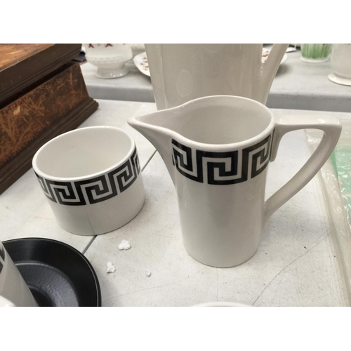 187 - A PORTMEIRION COFFEE SET IN THE 'GREEK KEY' DESIGN TO INCLUDE COFFEE POT, CREAM JUG, SUGAR BOWL, CUP... 