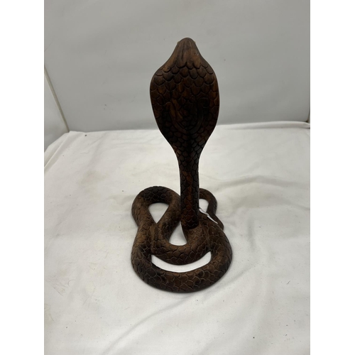 65 - A CARVED WOODEN COBRA HEIGHT 26CM