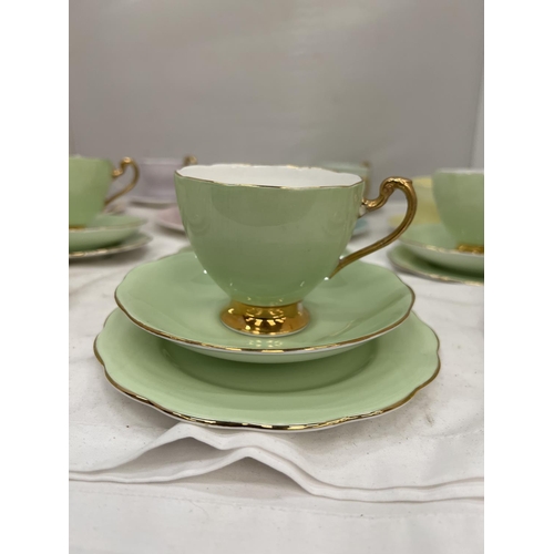 88 - A SET OF SIX 'PARAGON' SMALL CUPS AND SAUCERS IN DIFFERENT COLOURS PLUS A SET OF SIX ROSLYN CHINA TR... 