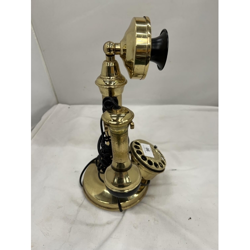 90 - A VINTAGE STYLE BRASS COLOURED CANDLESTICK TELEPHONE