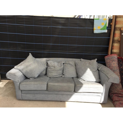 2567 - A PAIR OF MODERN GREY TWO SEATER SETTEES WITH TWELVE LOOSE CUSHIONS AND ANTIMACASSARS