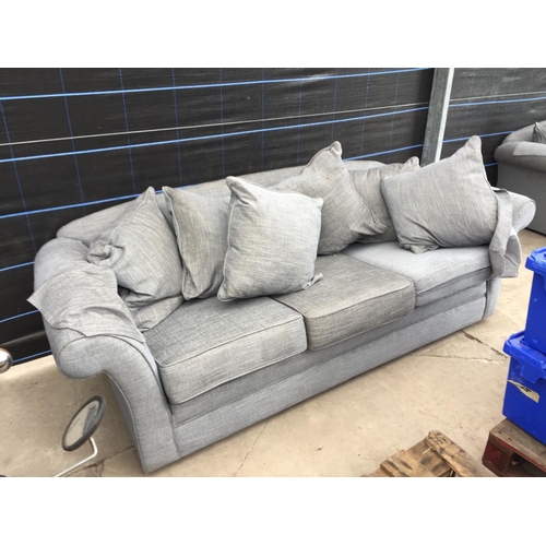 2567 - A PAIR OF MODERN GREY TWO SEATER SETTEES WITH TWELVE LOOSE CUSHIONS AND ANTIMACASSARS