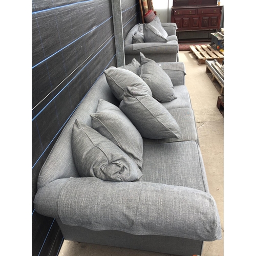 2567 - A PAIR OF MODERN GREY TWO SEATER SETTEES WITH TWELVE LOOSE CUSHIONS AND ANTIMACASSARS