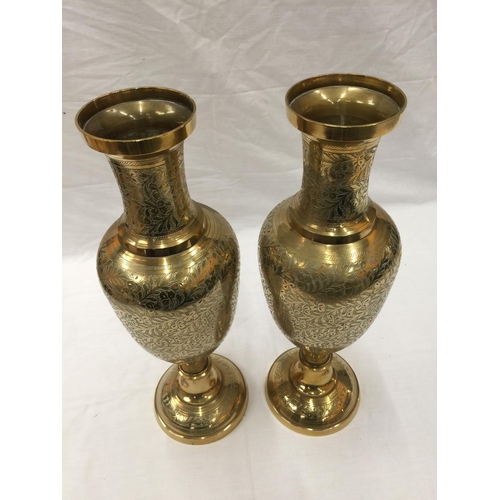 15 - A PAIR OF HEAVY BRASS INDIAN STYLE VASES WITH ETCHED FLORAL LEAF DESIGN H: 45CM