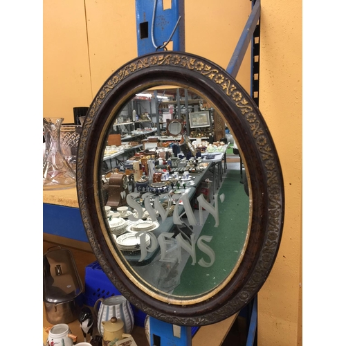 39 - A VINTAGE OVAL SWAN PENS MIRROR WITH GILT DECORATION TO FRAME H: 49CM