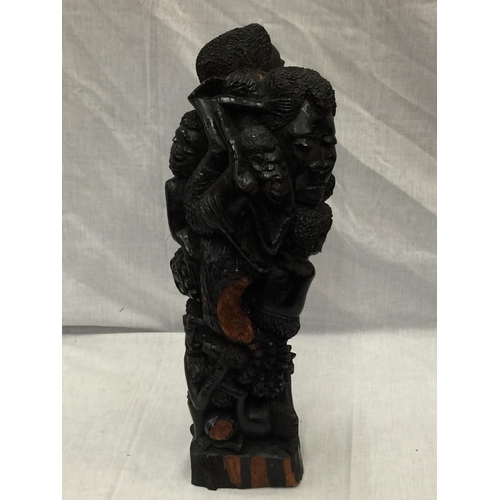 41 - A LARGE HAND CARVED AFRICAN TRIBAL STYLE FIGURE H: 54CM