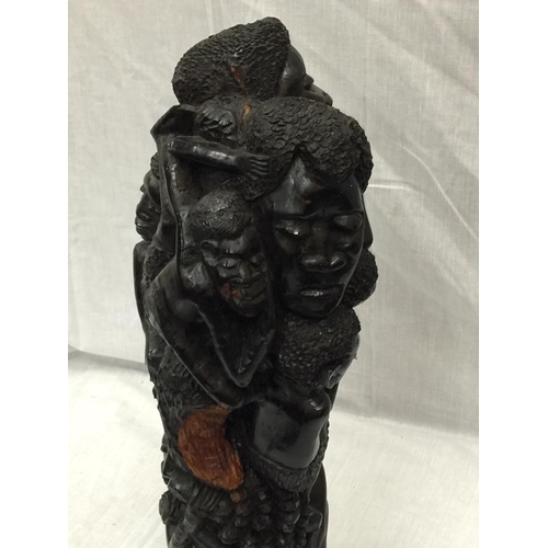 41 - A LARGE HAND CARVED AFRICAN TRIBAL STYLE FIGURE H: 54CM