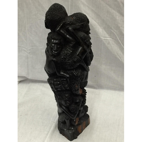 41 - A LARGE HAND CARVED AFRICAN TRIBAL STYLE FIGURE H: 54CM