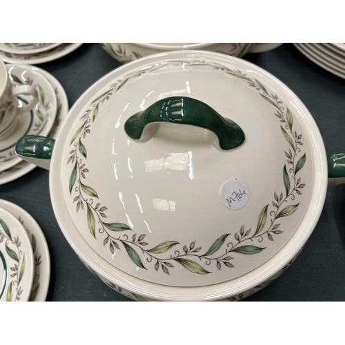 56 - A ROYAL DOULTON 'ALMOND WILLOW' REG NO. 6373 DINNER SERVICE TO INCLUDE PLATES, TUREENS, DESSERT BOWL... 