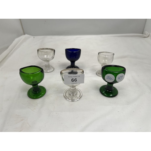 66 - SIX COLOURED GLASS VINTAGE EYE BATHS